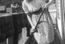 018: Anne McCarthy sweeping mats on the family porch. (circa 1942)- daughter of James McCarthy &amp;amp; Julia Reddy